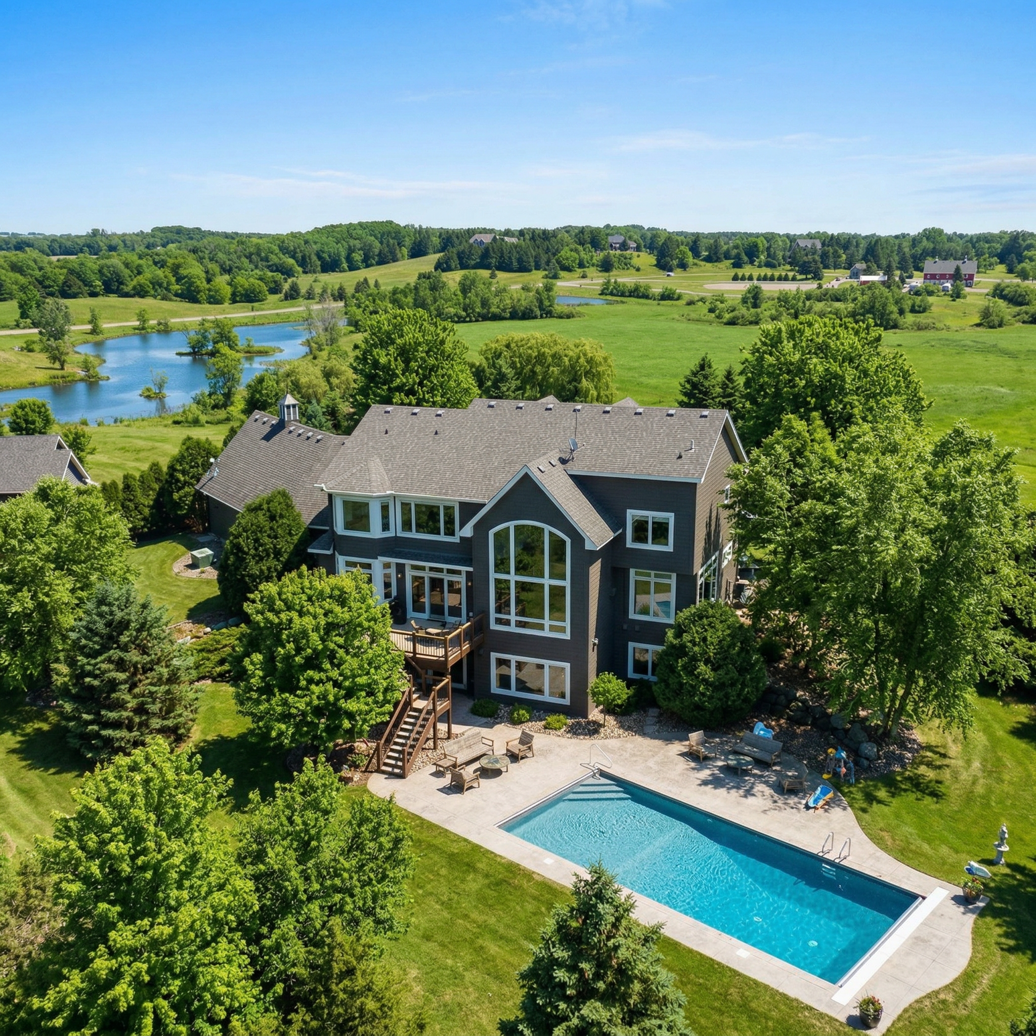 A resort style pool and expansive recreation area anchor an outdoor experience.