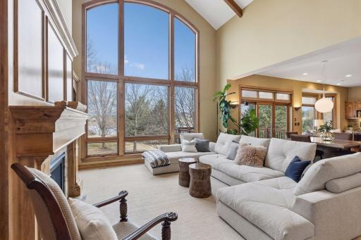 Soring ceilings and floor to ceiling glass windows overlook 8 glorious private acres and water.