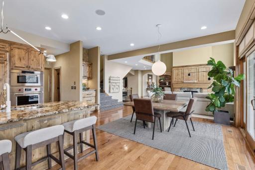 Seamless open-concept flow bathed in natral light, perfect for family living and effortless entertaining.