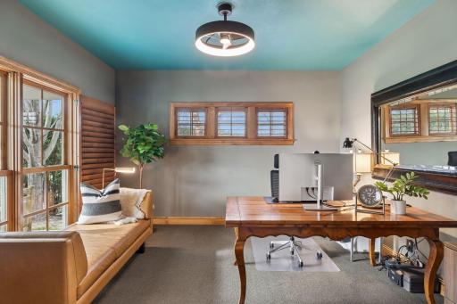 A private main floor office just off the foyer with oversized expansive windows overlooking the courtyard makes this a peaceful and quiet work space.