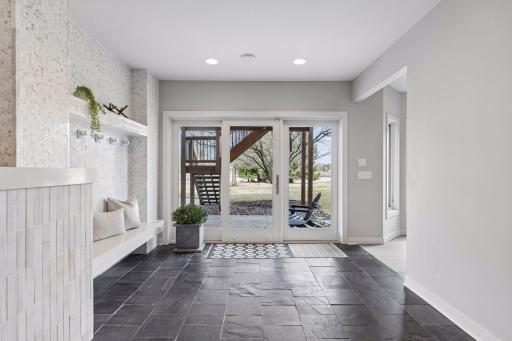 This expansive light transition between indoors and outdoors is durable and can manage high traffic during your pool parties