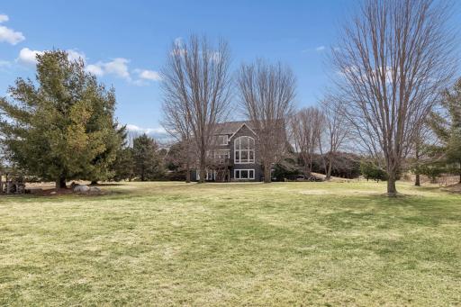 Breathtaking landscaping and total privacy abound.