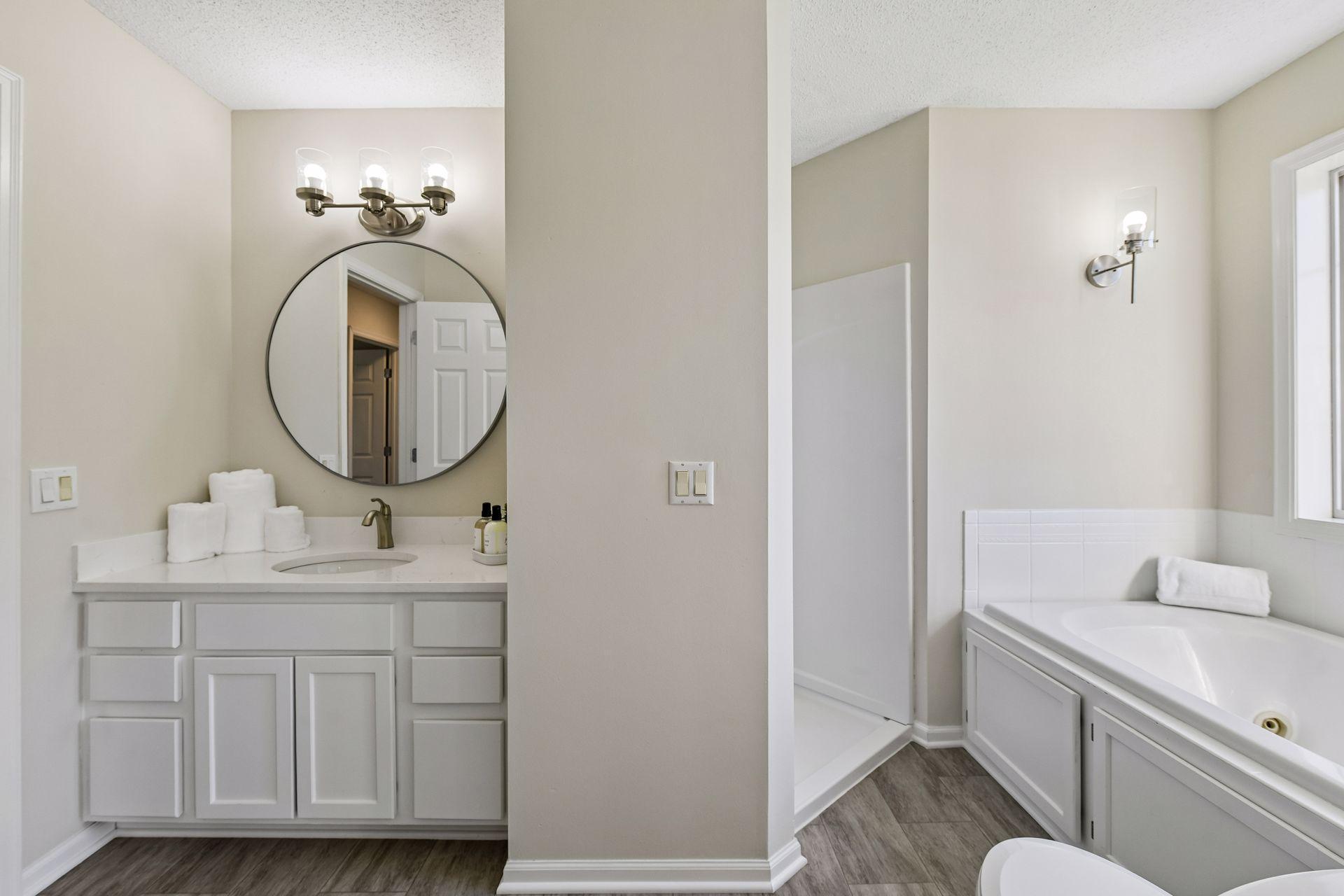 Separate shower and tub. Buyer to provide their own shower door for new shower surround.