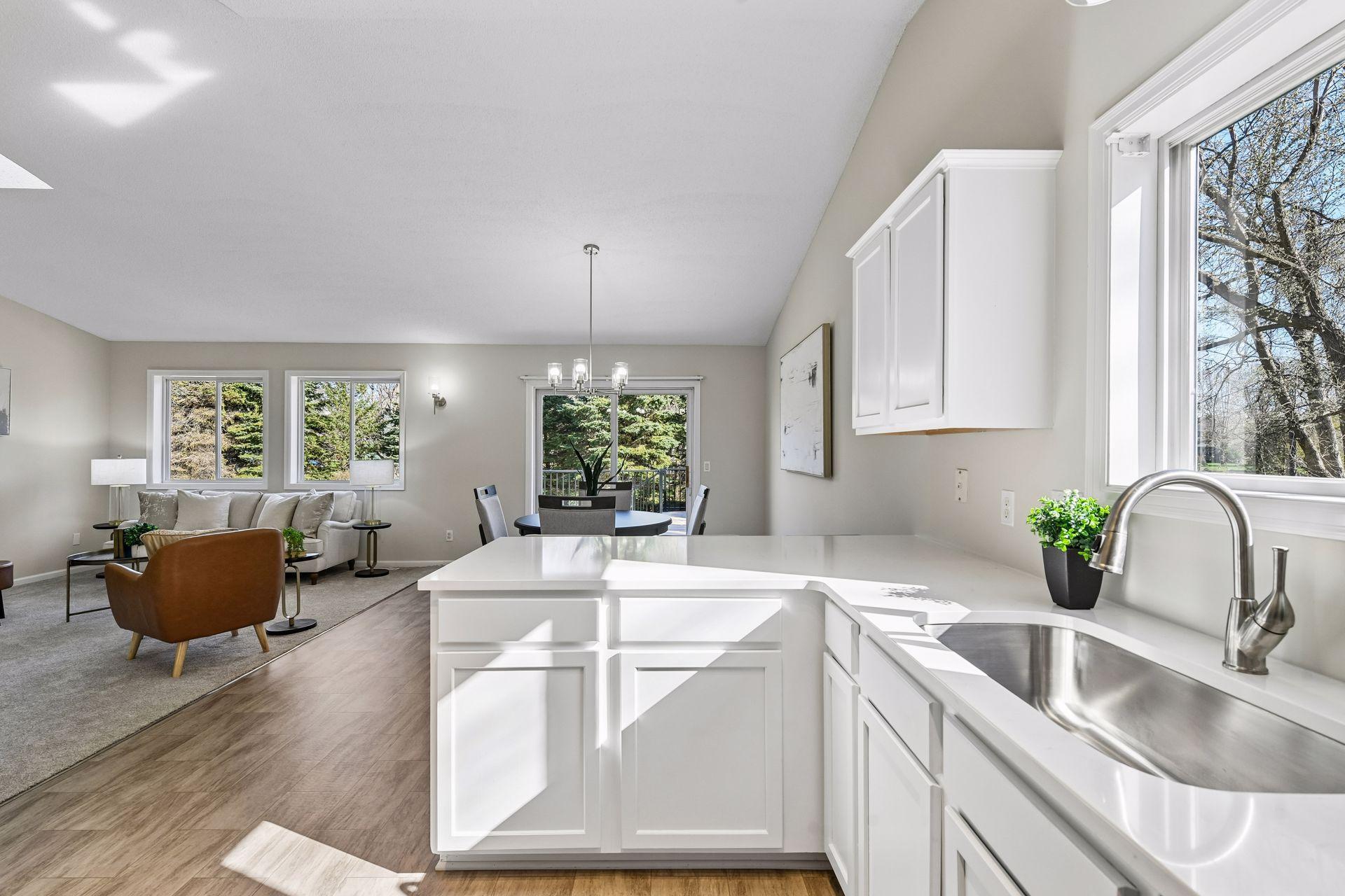 Be a part of the action when in the kitchen with views while doing dishes, out towards the back deck / sliding door or living room.