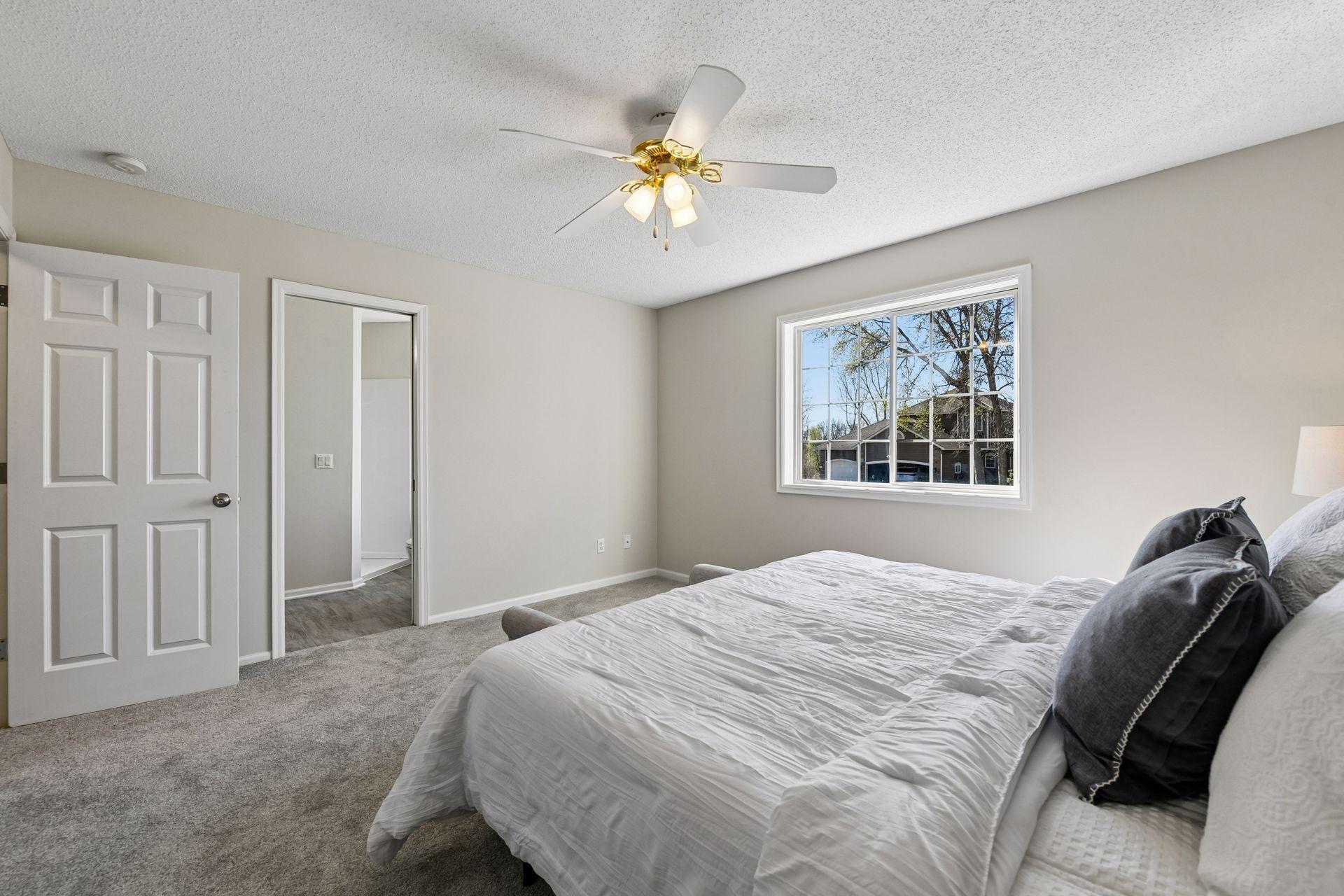 Primary bedroom with pocket door to update main level full bathroom.