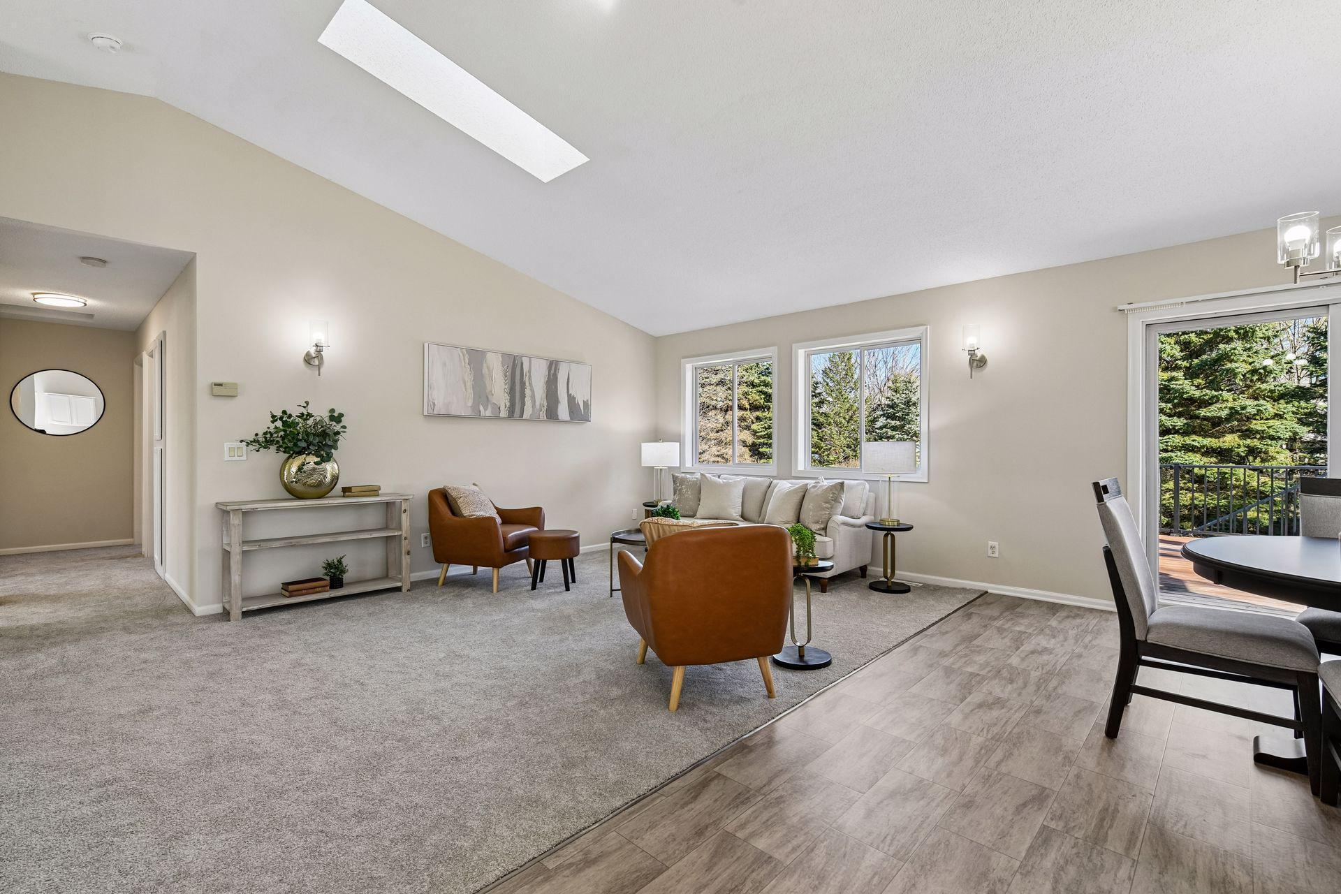 Main level with three bedrooms flow down the hallway. This home offers crisp update with a ton of light from all sides.