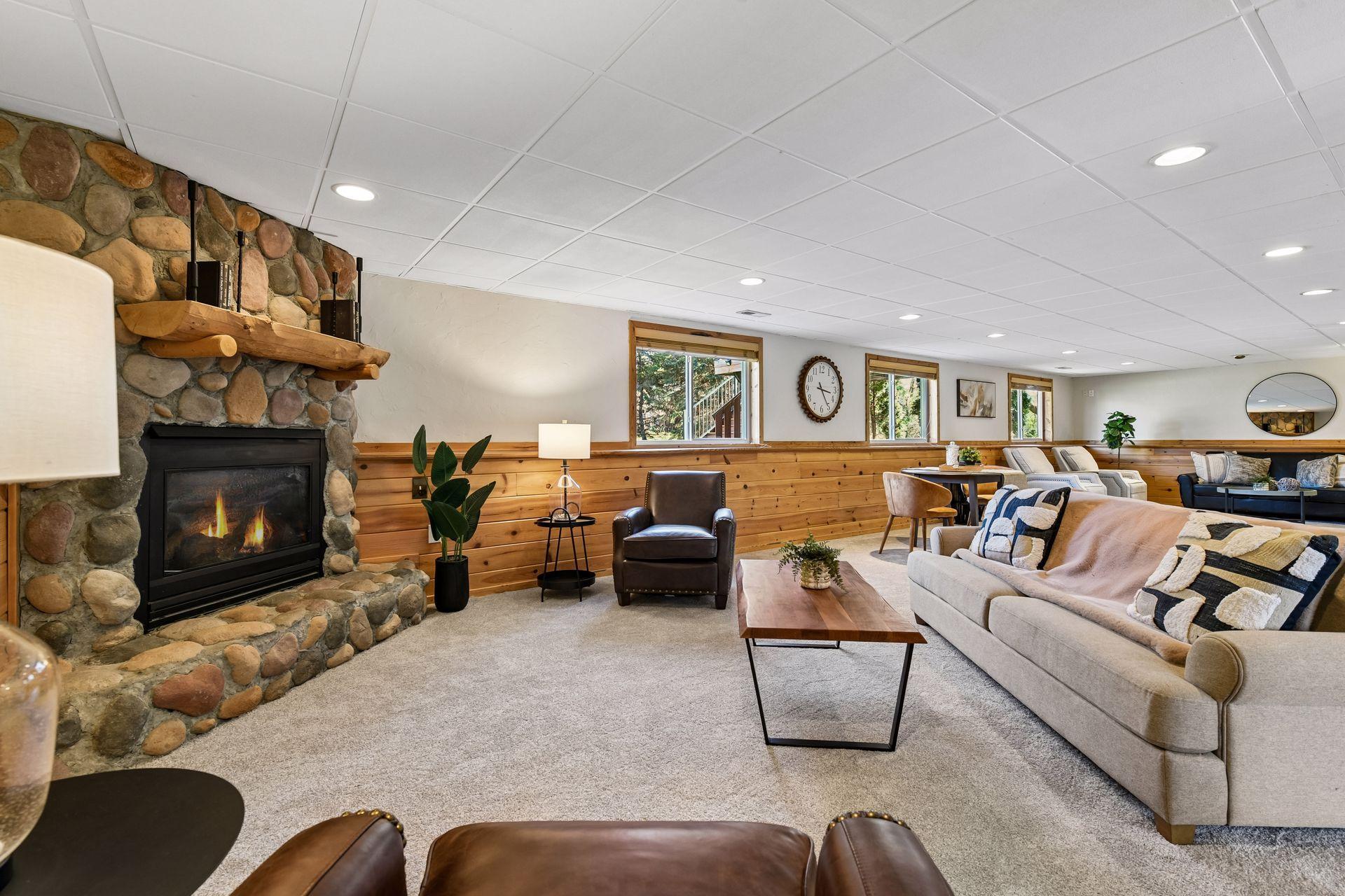 Cozy family with fireplace for year-round use and ideal lookout windows to feel the outdoors from inside.