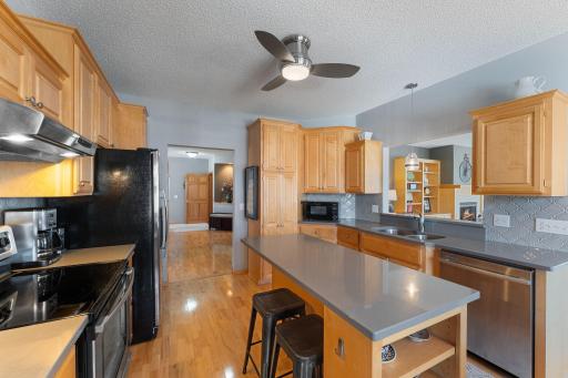 Kitchen overlooks dining area and living room