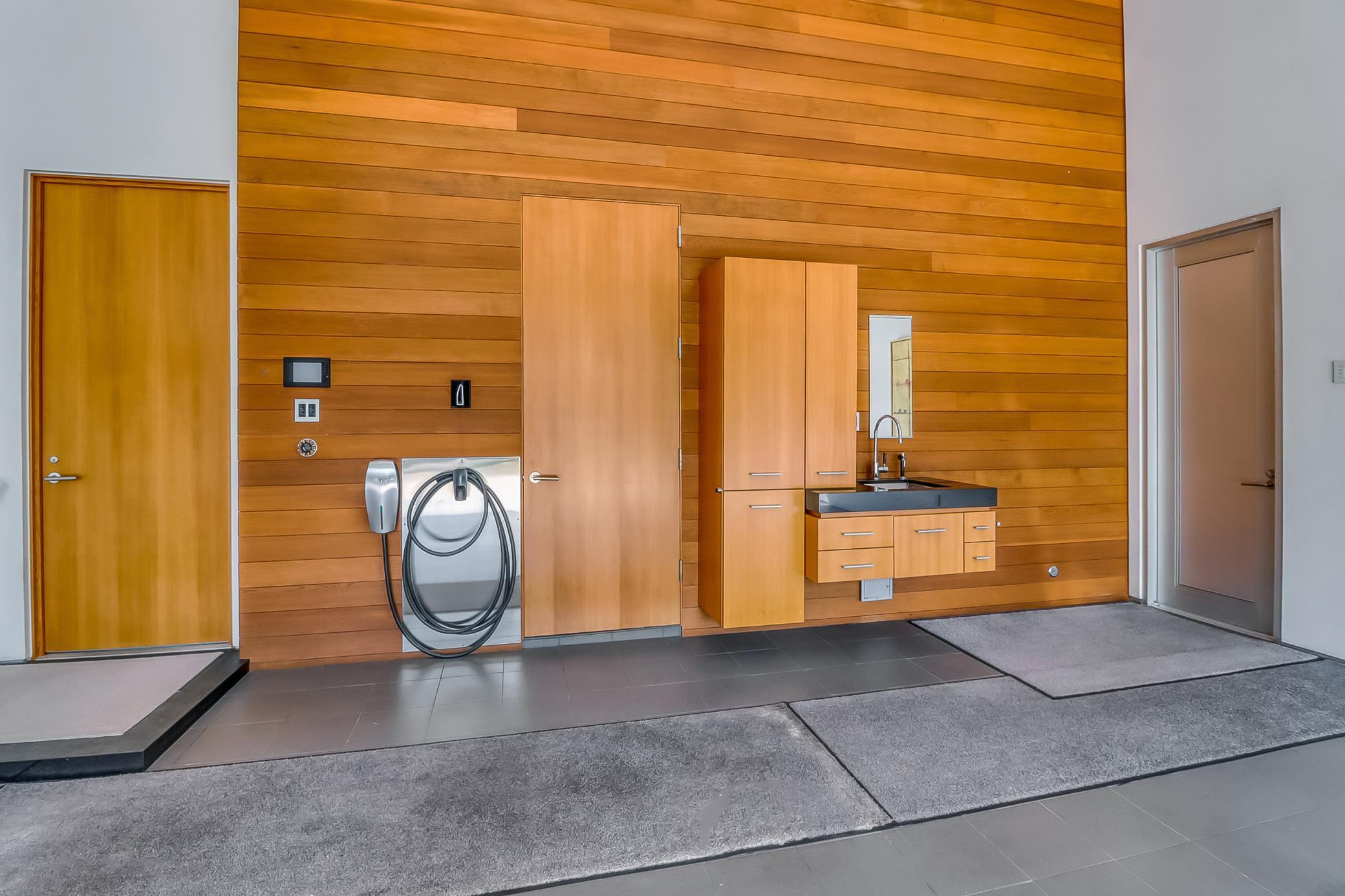 Garage fitted with Tesla plug in and also 220