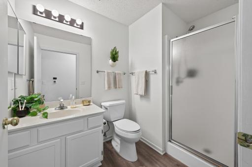 The hall bath is freshly painted and has updated flooing and new toilet.