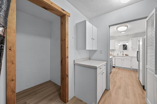View into the storage unit. Great storage offered here with cabinets.