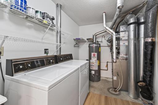 Laundry/utility room off of the kitchen. The storage unity is to the right.