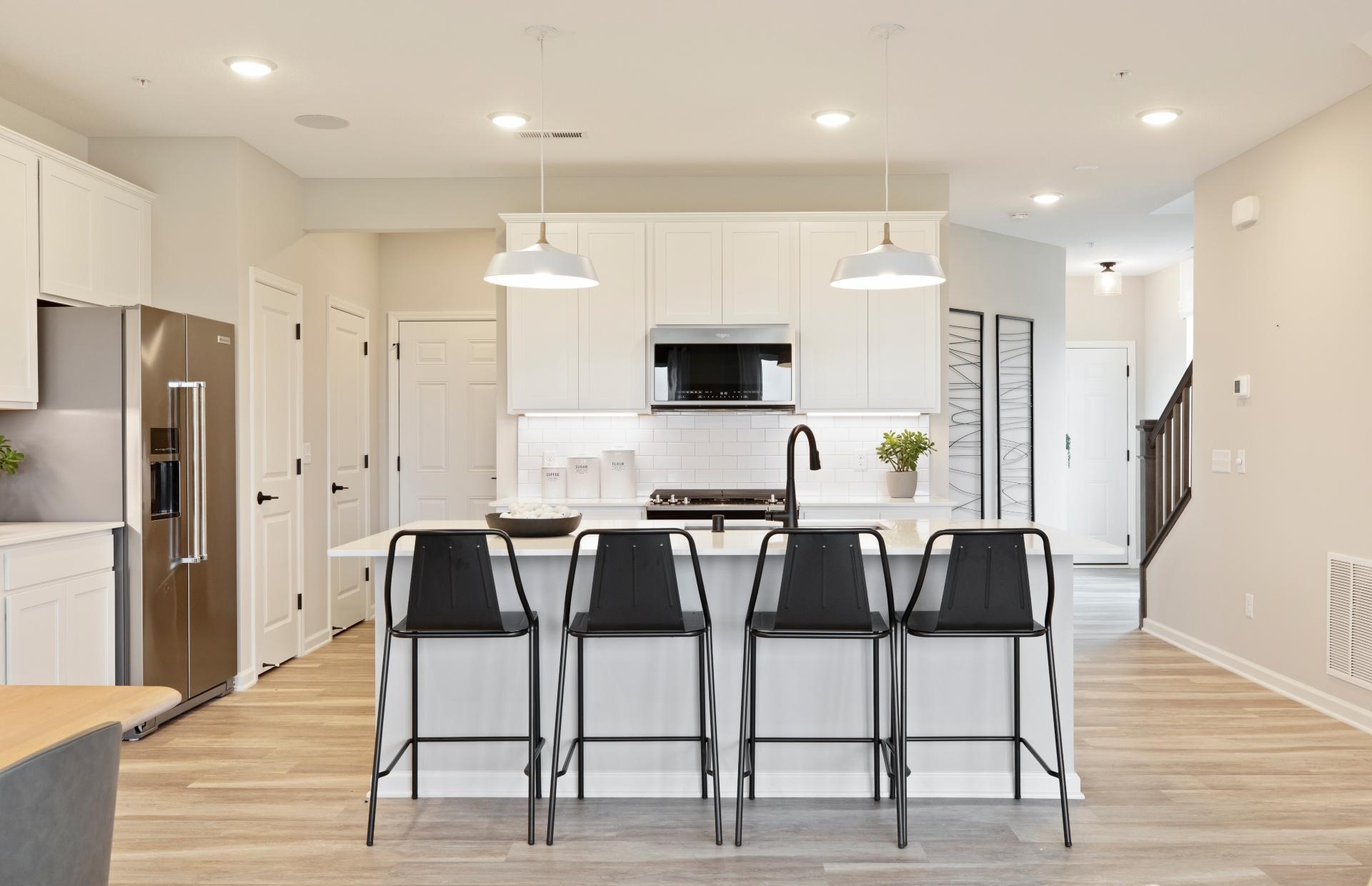 Plenty of Room for Bar Stools. Photo is of a model home