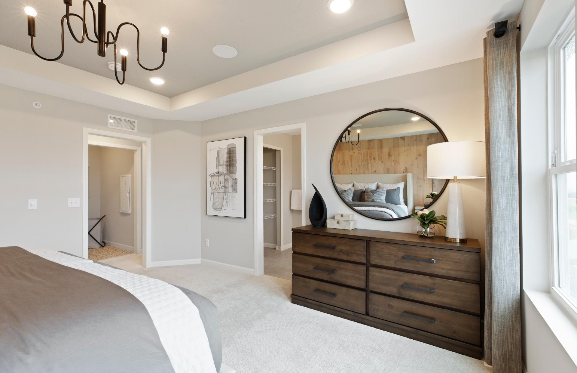 Large Primary Bedroom. Photo is of a model home