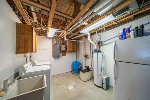 Utility room and laundry area in lower level