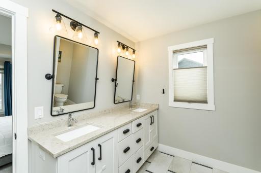 Primary bathroom with heated floors and double sinks