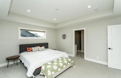 Primary suite with view to attached bathroom