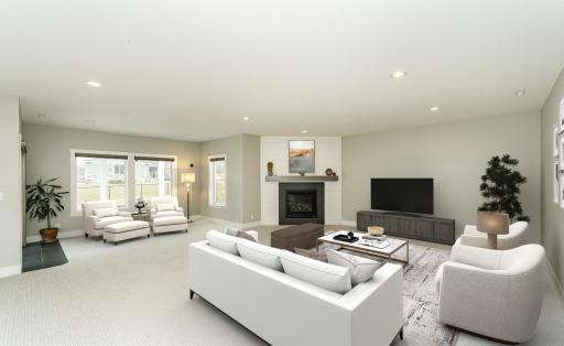 Lower level family room with gas fireplace and walk-out to patio