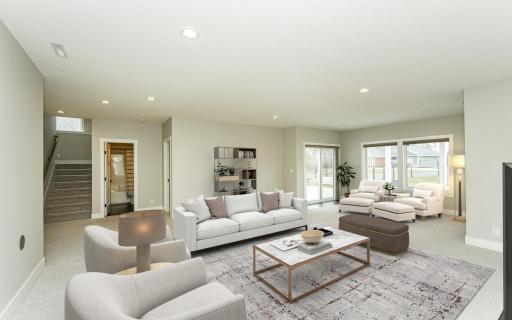 Lower level family room with gas fireplace and walk-out to patio