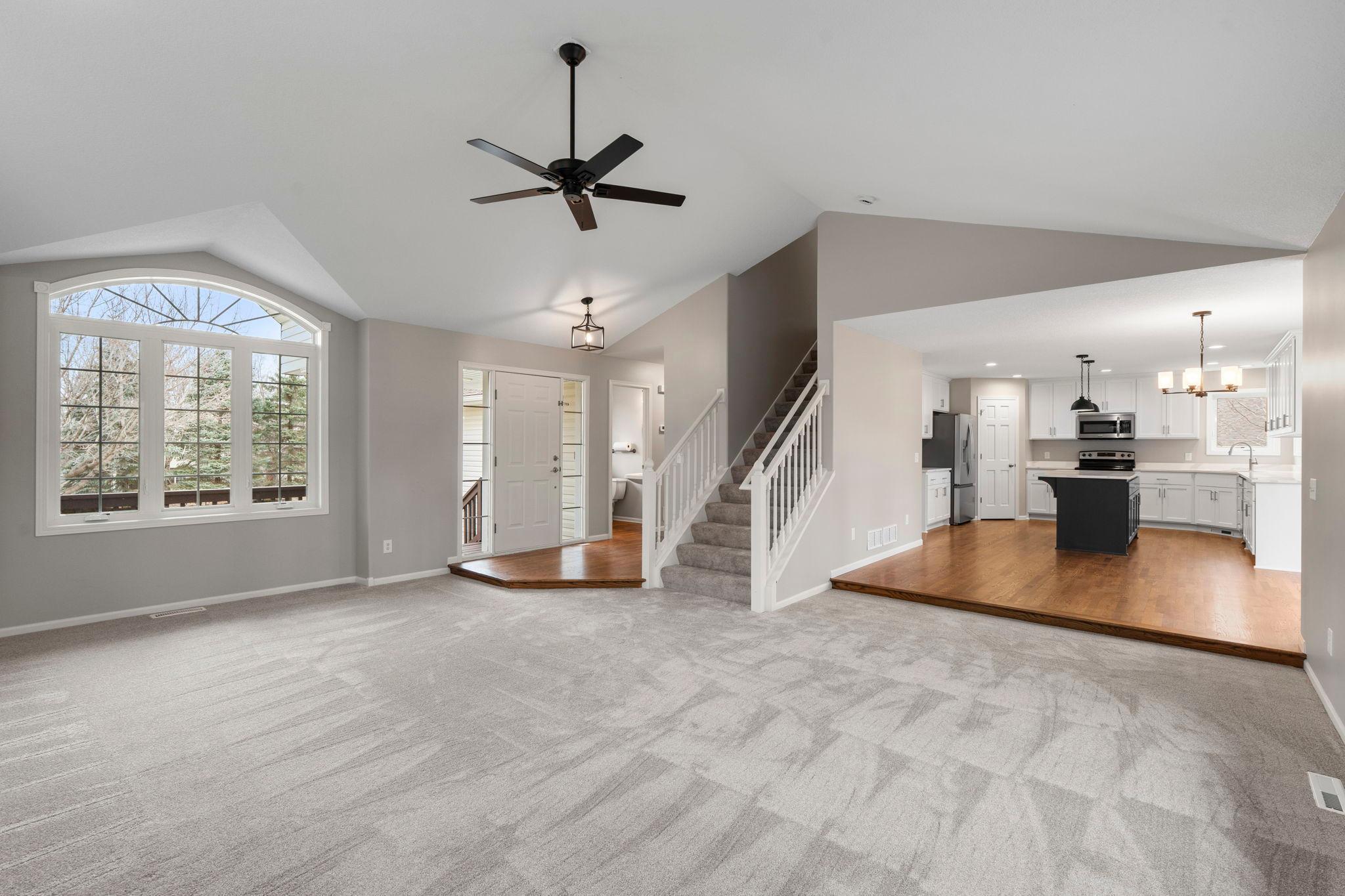 Gorgeous updates! New carpeting, neutral / modern paint colors. White trim and doors! Rinished hardwood flooring is stunning.