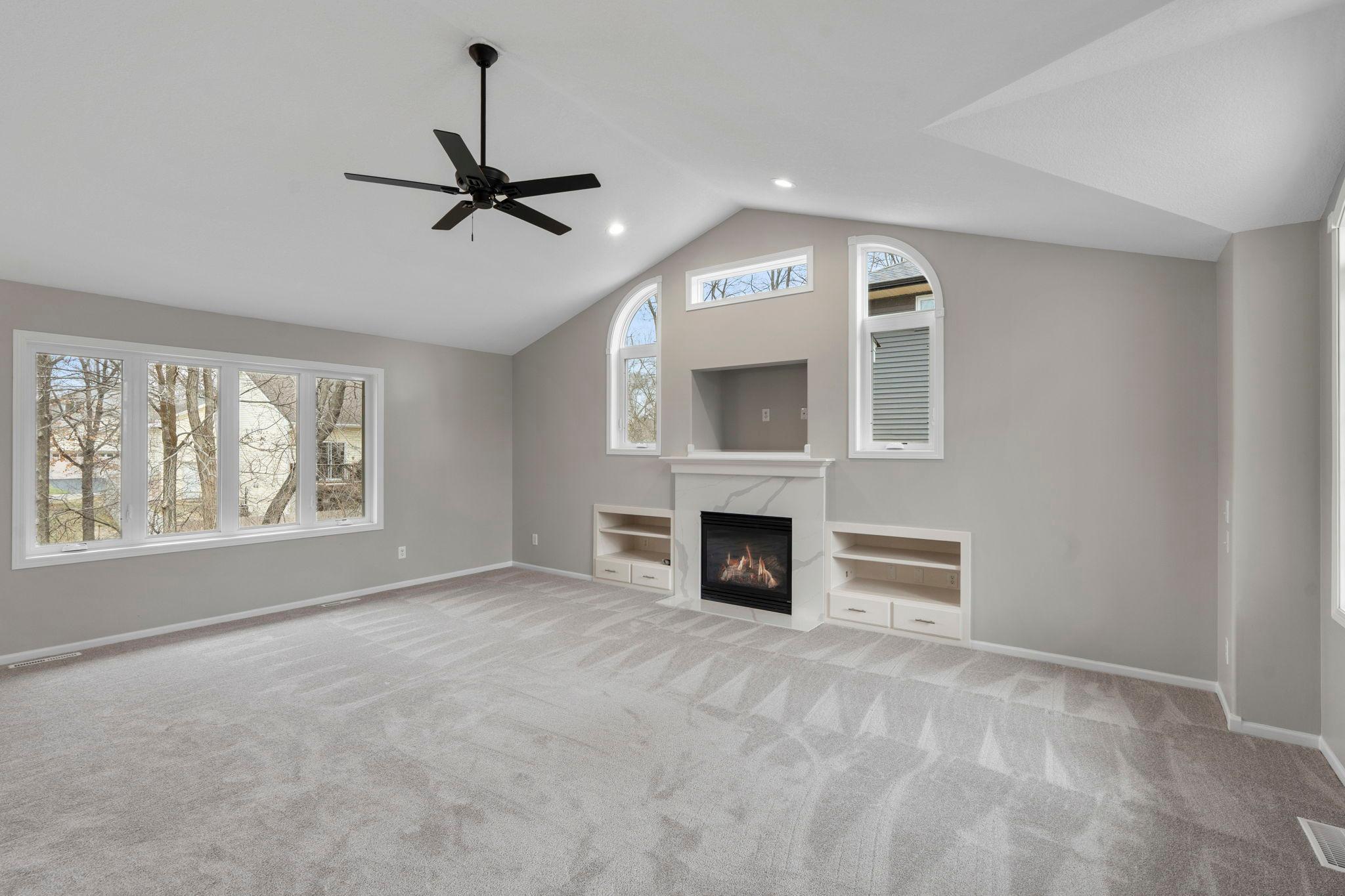 Incredible living room space! Large windows, gas fireplace, built-ins! Fresh paint, new carpeting! Move in ready!