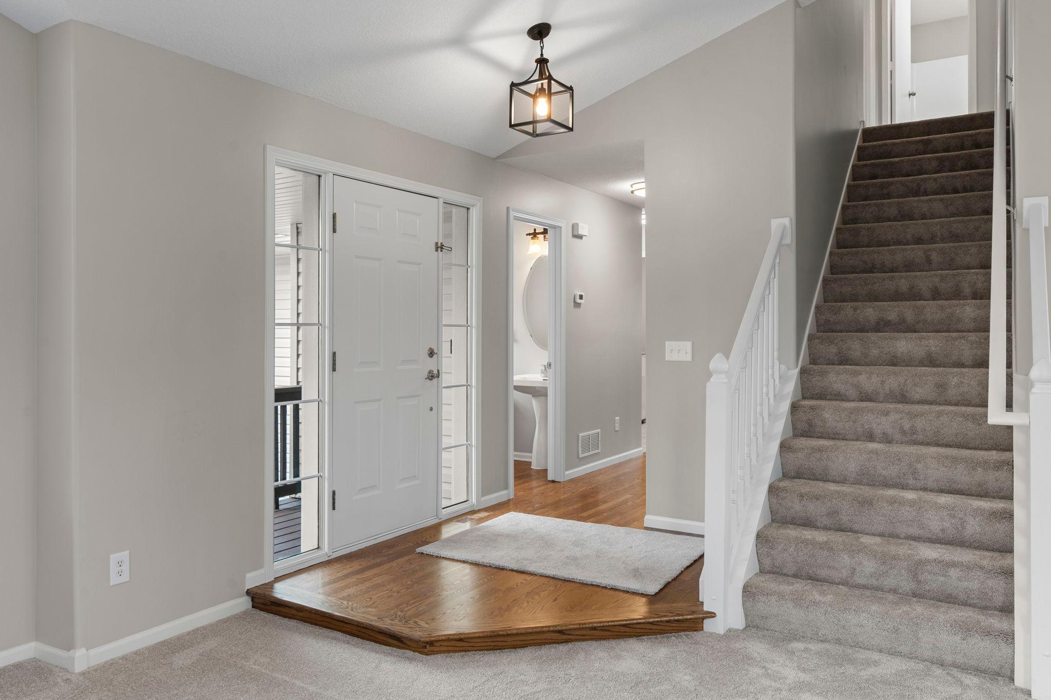 Welcome home! you'll love all the white trim, updated light fixtures, and 6 panel white doors.