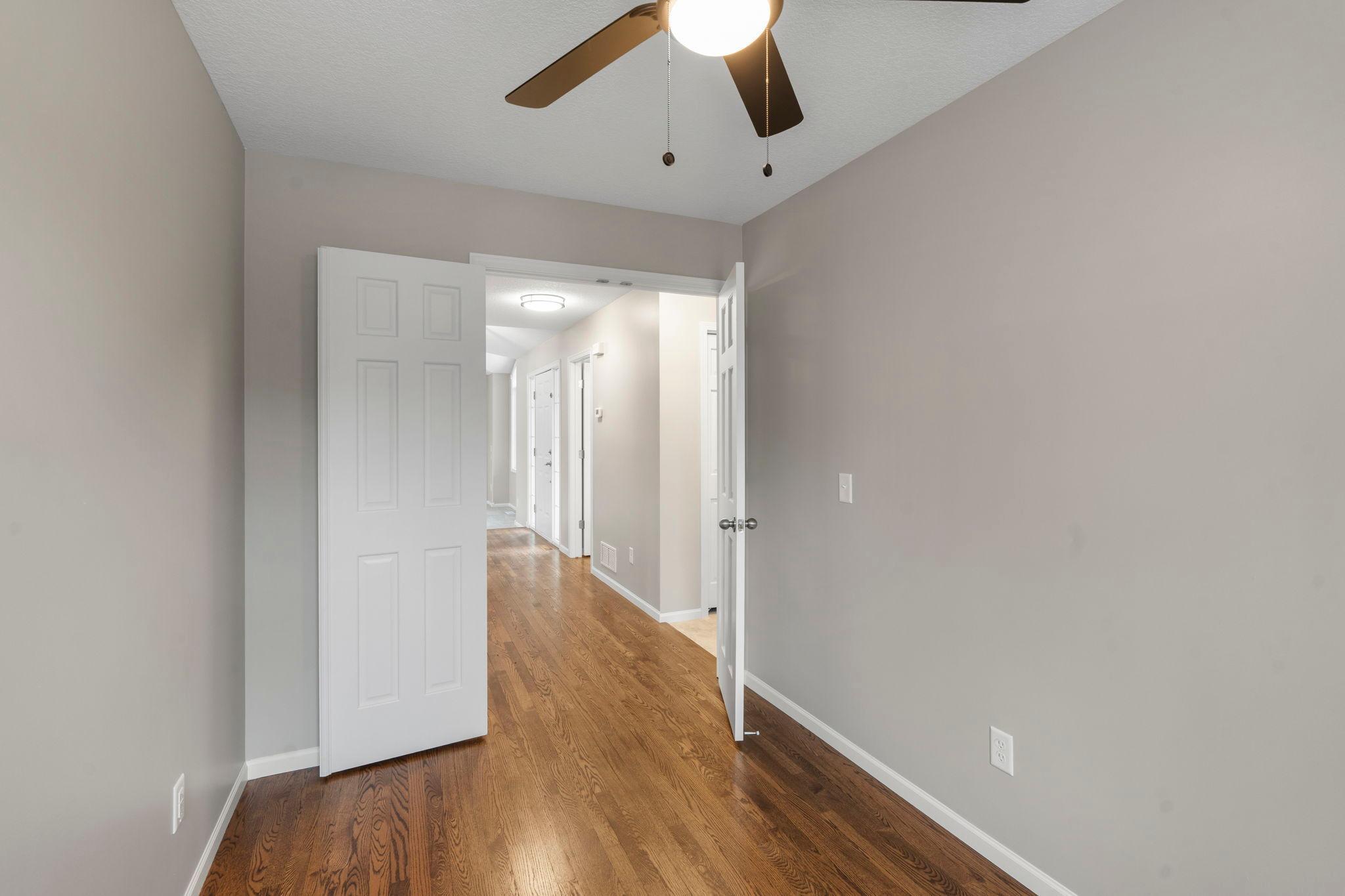 Convenient main level office space with French doors. Beautiful refinished hardwood floors.