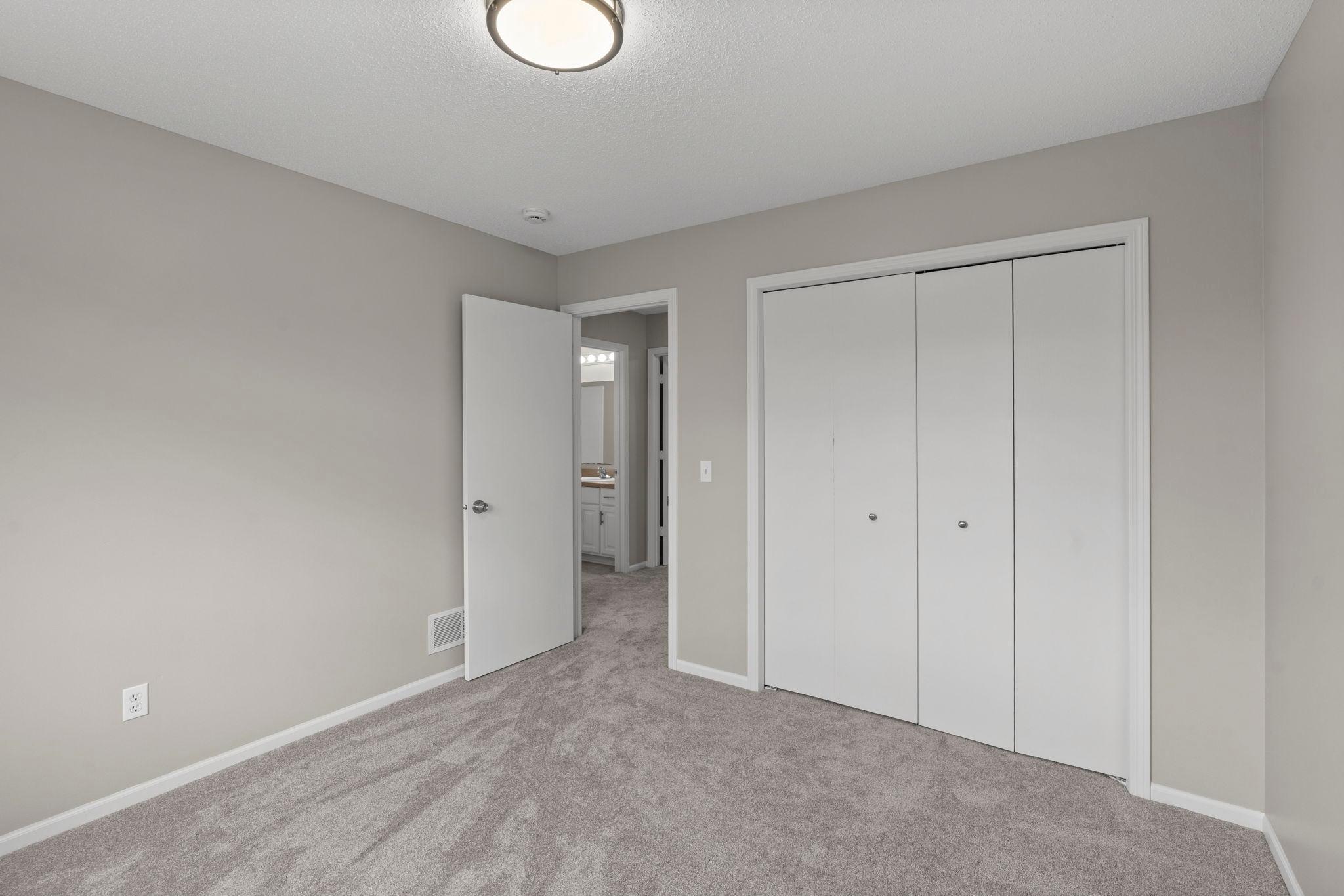 New carpeting, modern white trim and doors. Move in ready!