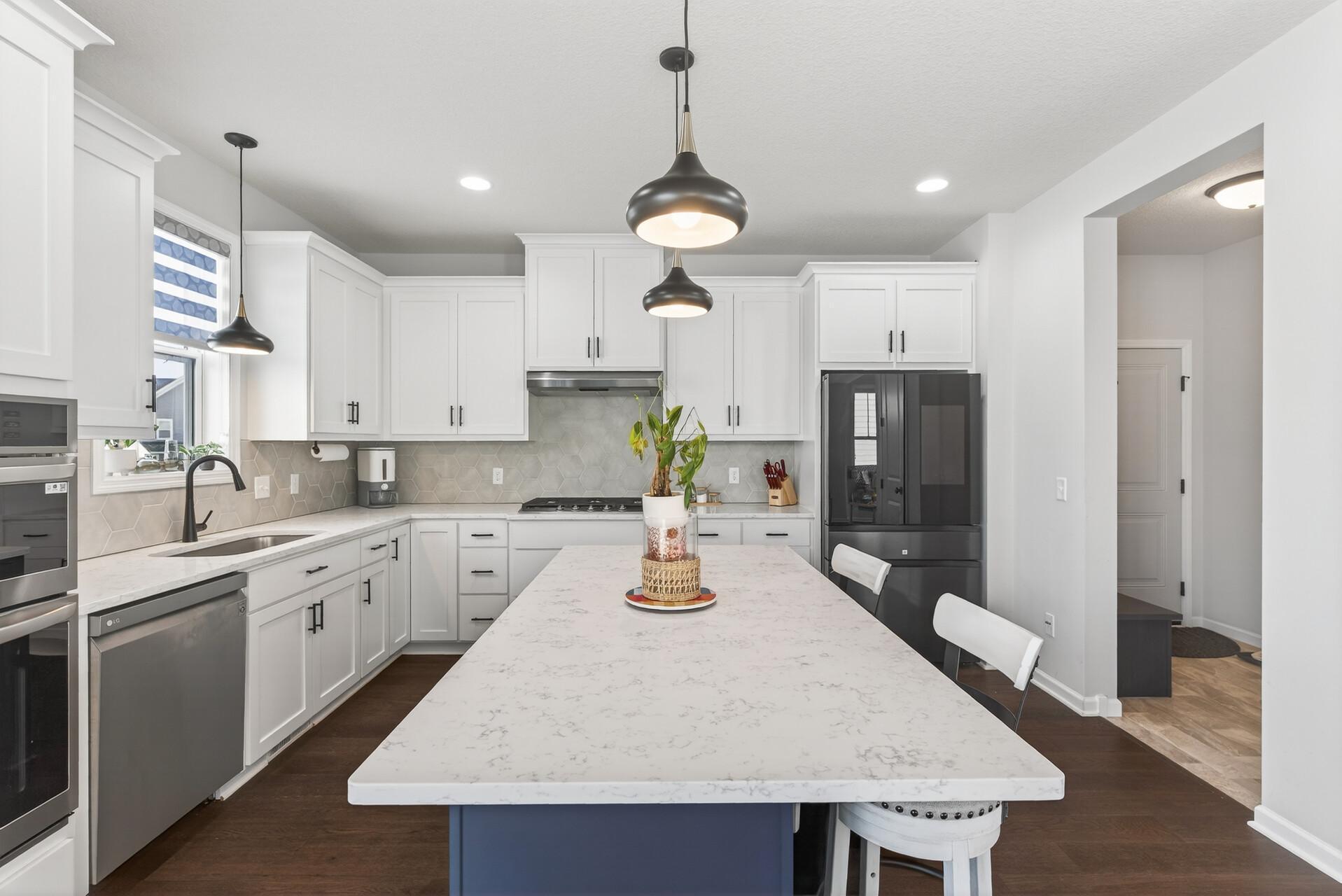 Large island for extra meal prep space or entertaining.