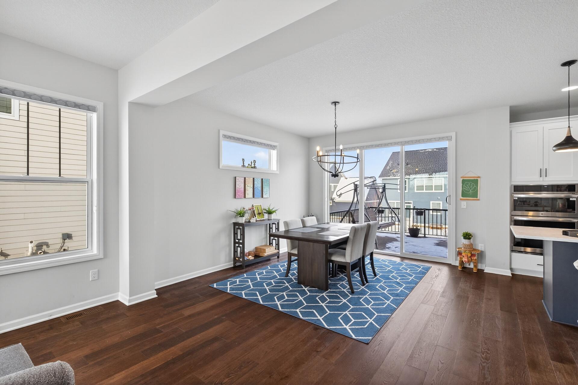 Large Dining Room that leads out to the maintenance free deck