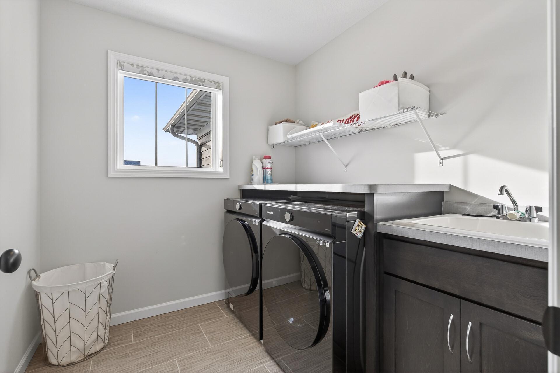 Second level laundry with non-builder washer and dryer