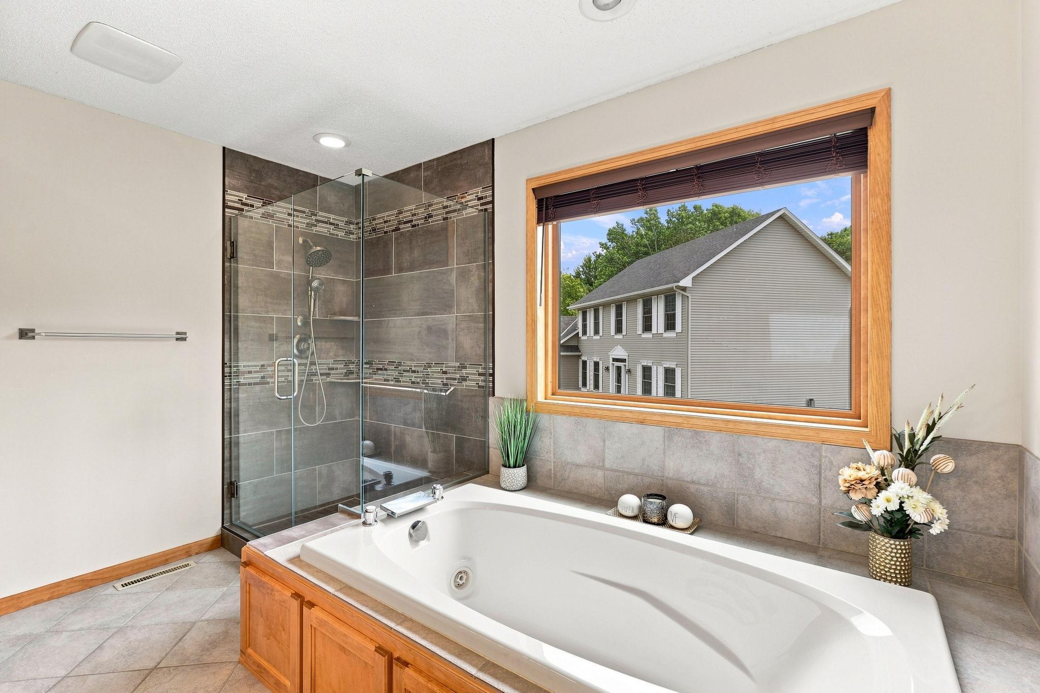 Ensuite boasts a large jetted tub and updated walk-in shower.