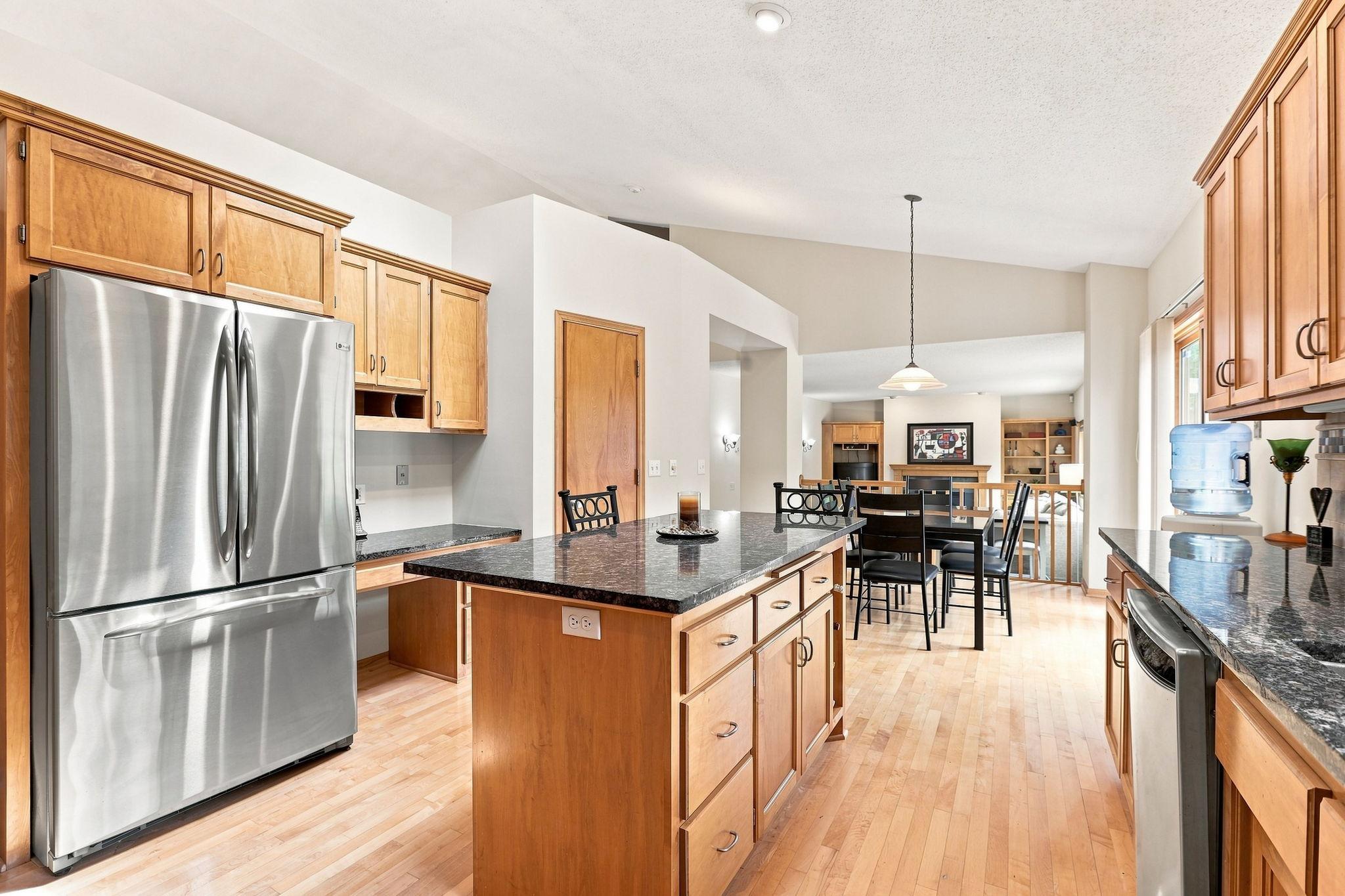 Center island adds more workable space for entertaining and meal prep.