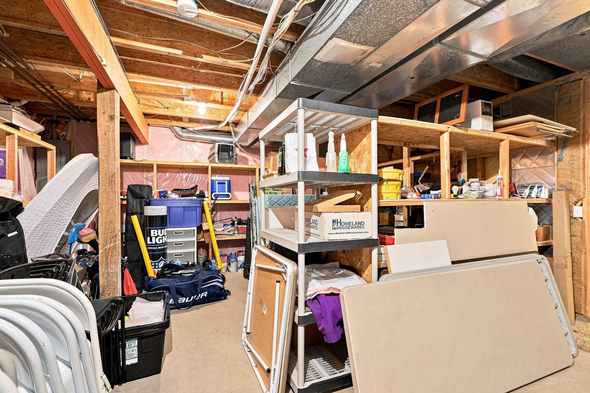 The basement mechanical room offers an abundance of storage