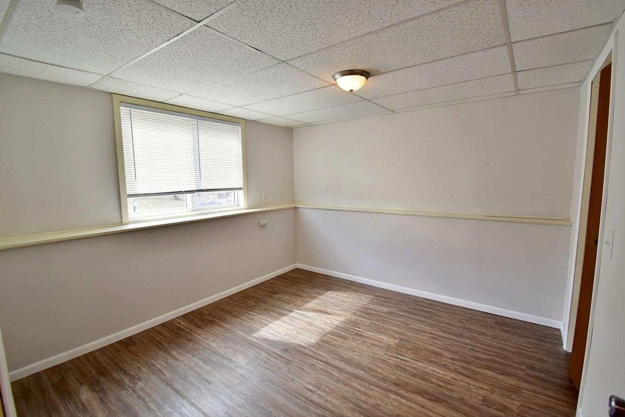 downstairs bedroom 3.png virtual staged