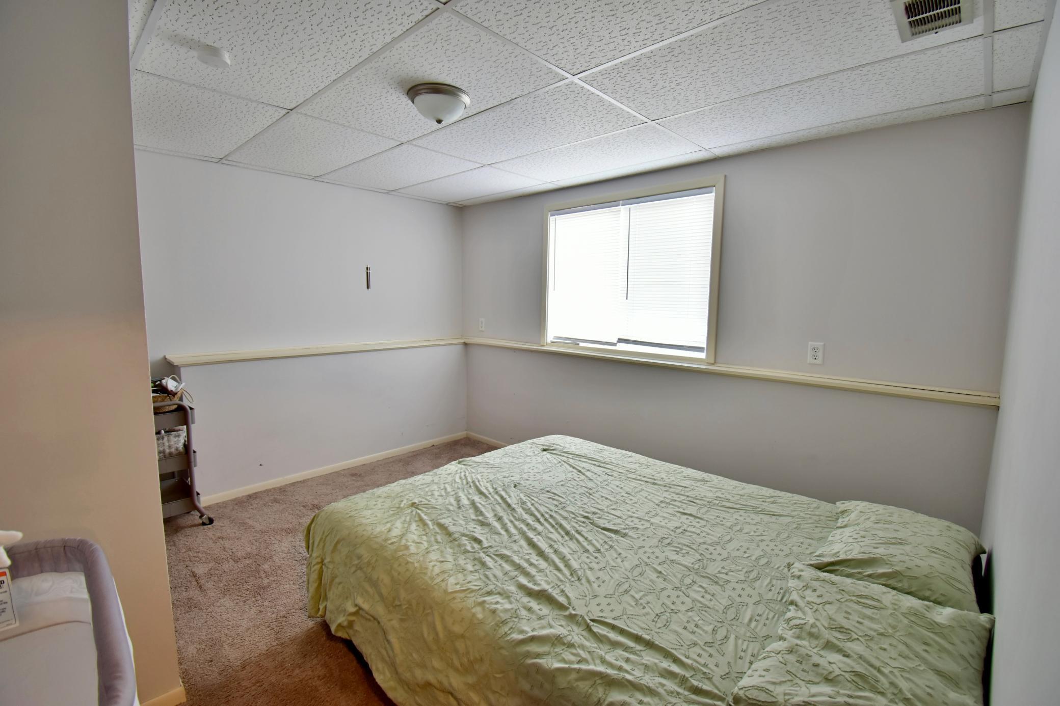 Downstairs bedroom 5 virtually staged