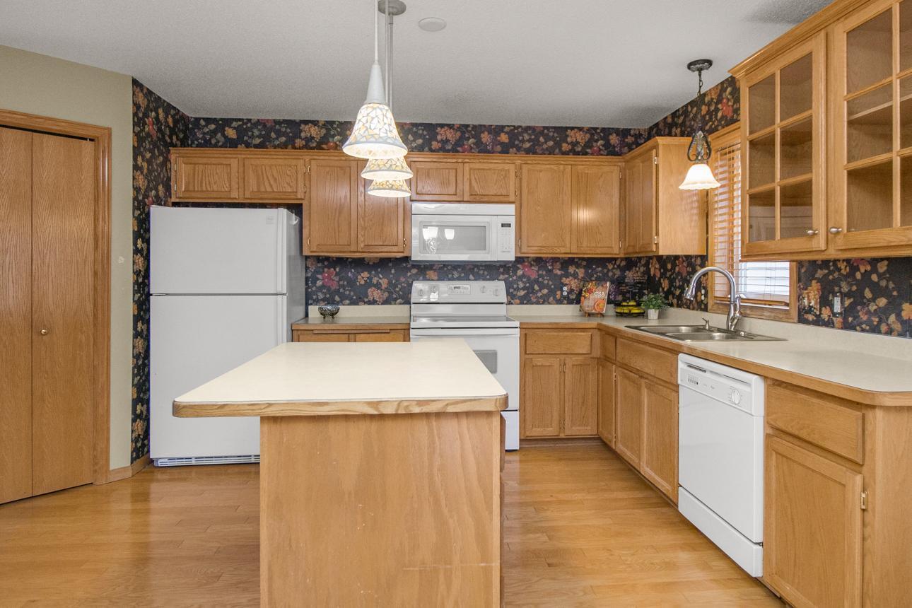 Kitchen with Center Island and Hardwood Floors