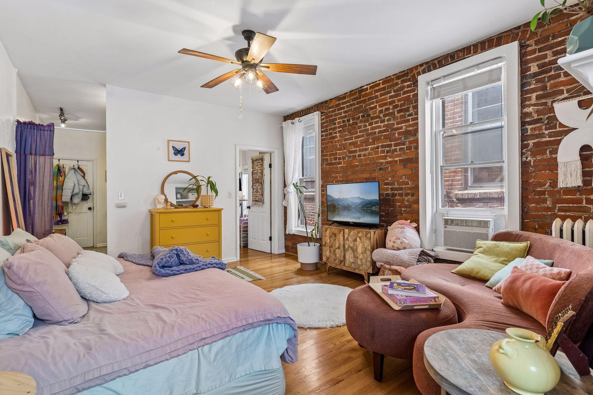 Main Living Area - Original Exposed Brick Wall