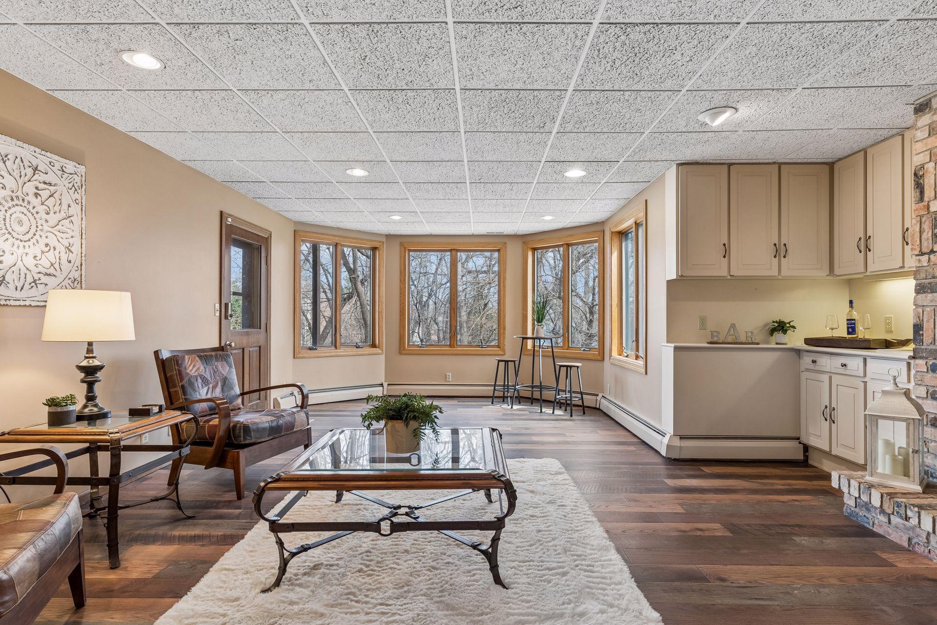 Lower Level living space with fireplace and walkout to backyard.