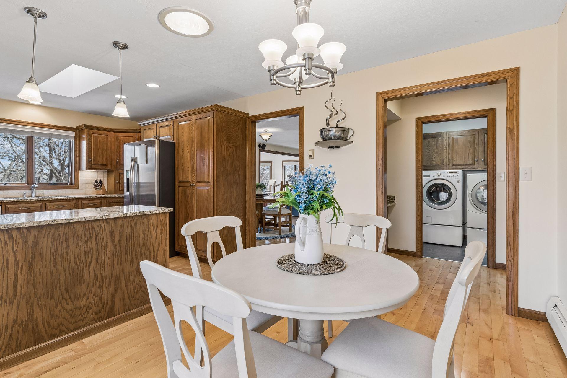 Kitchen open to Dining and Living areas.