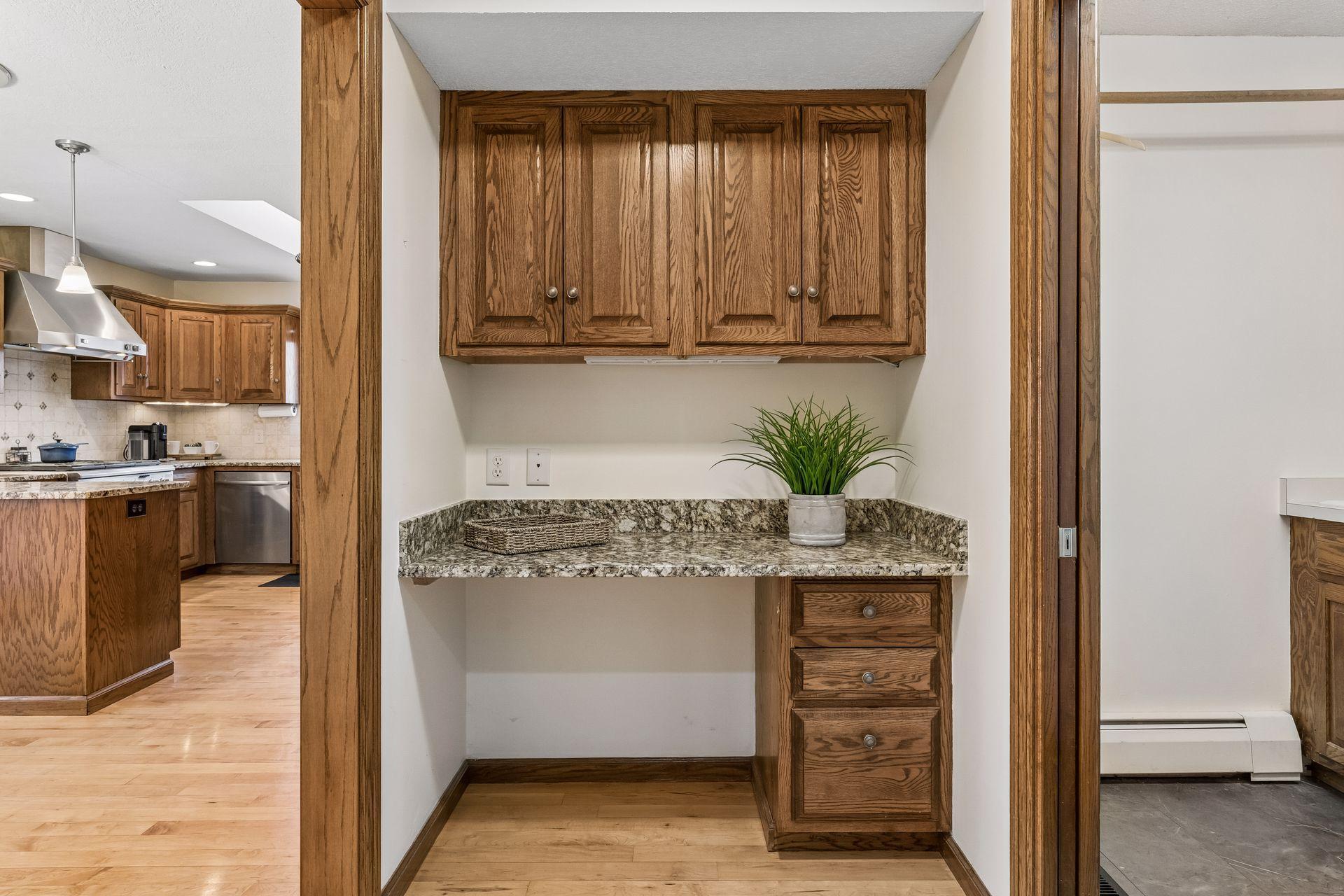 Off the garage entrance and between the kitchen and laundry is a convenient drop space for keys and bags.