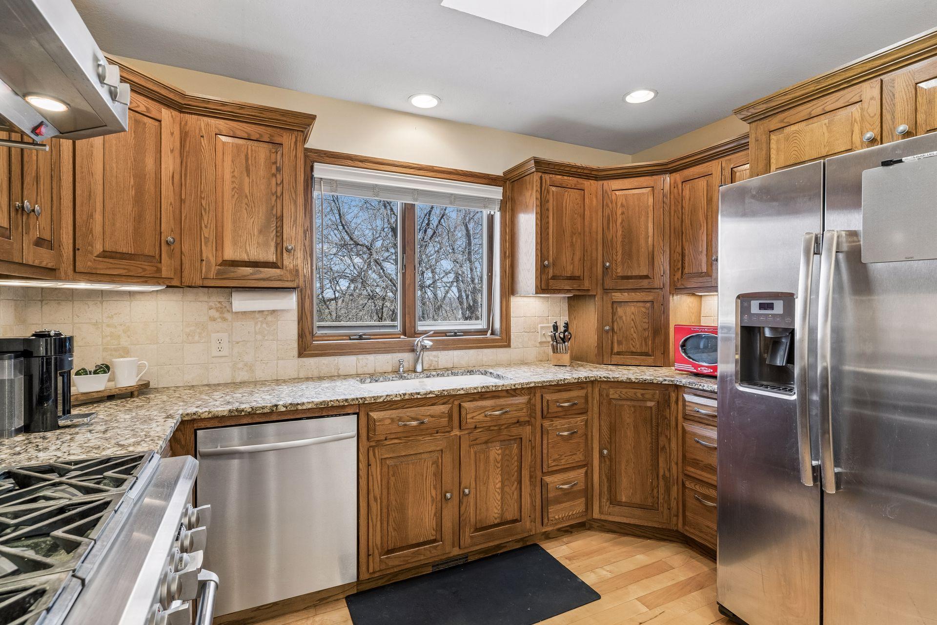 Great functional kitchen with skylight.