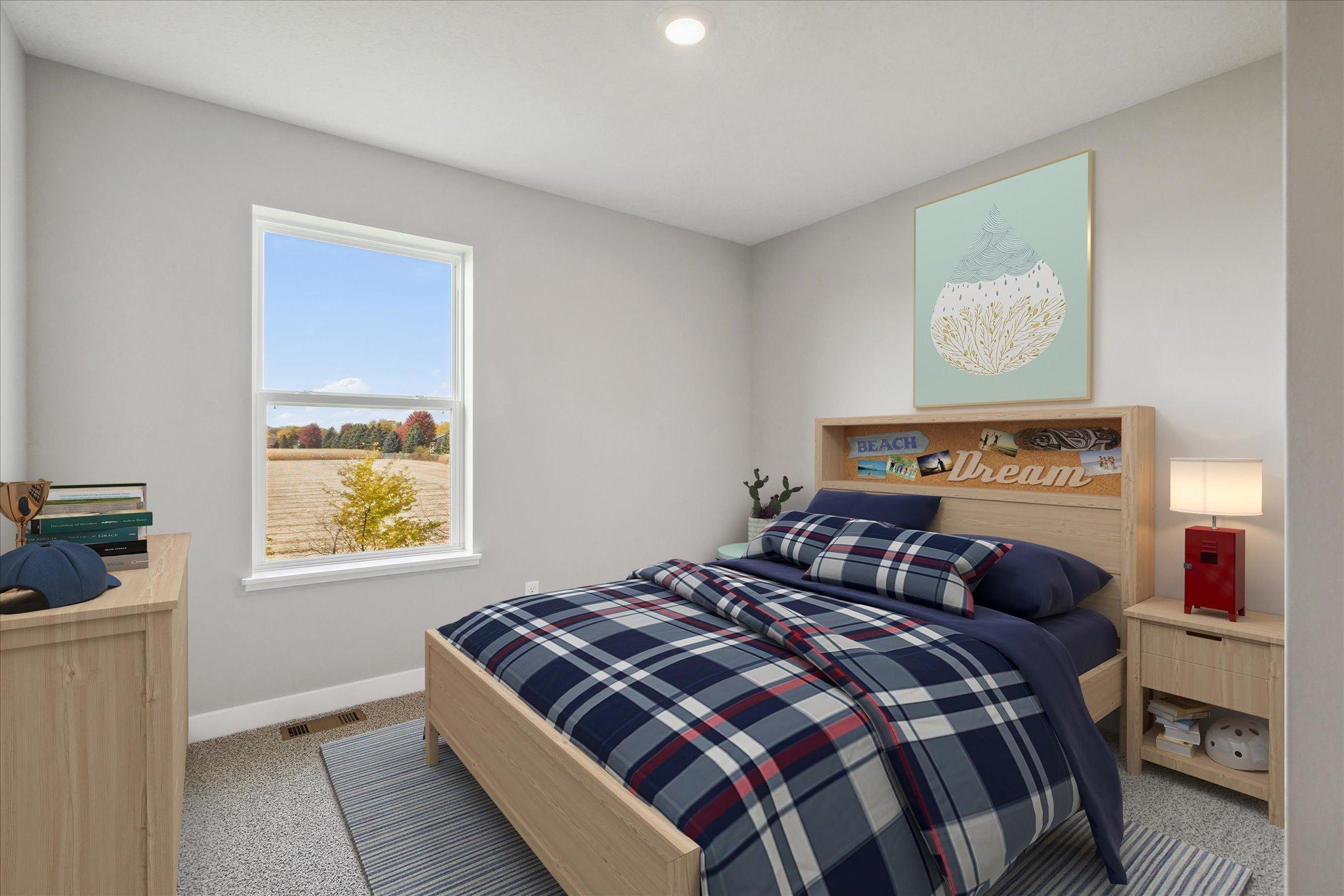 Each of the home's spacious secondary bedrooms feature well thought out window locations. Photo is of model home. Colors and options may vary. Ask Sales Agent for details.