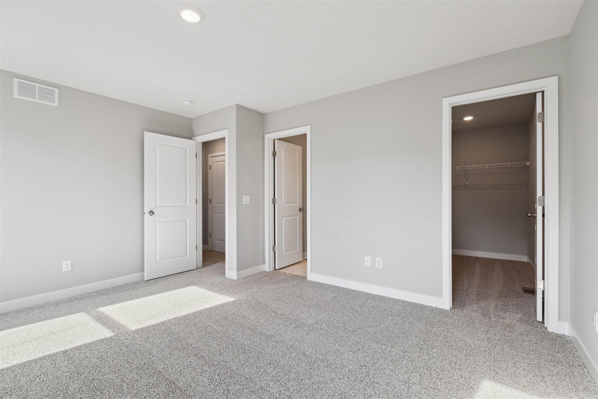 The very generous primary bedroom has plenty of space to fit your dream furniture set. Bedroom fits king-size furniture. Photo of Model Home. Options and colors may vary. Ask Sales Agent for details.