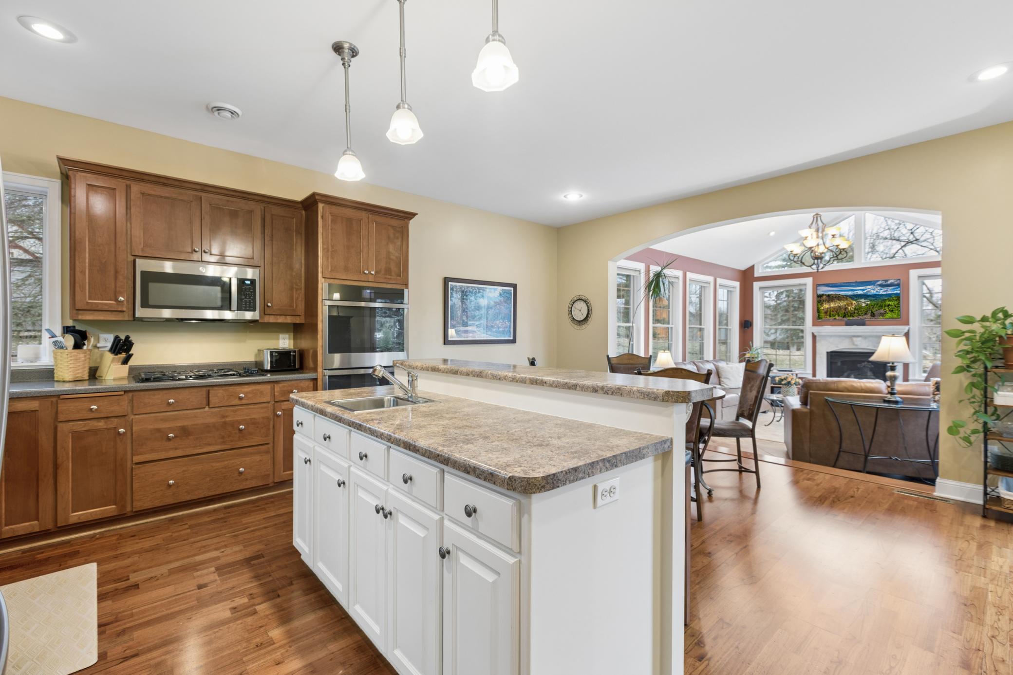 The open design of this floorplan was well thought out with multiple great living spaces on the main level, four bedrooms upstairs and an additional bedroom in the lower level. With plenty of storage and main level laundry it is hard to beat.