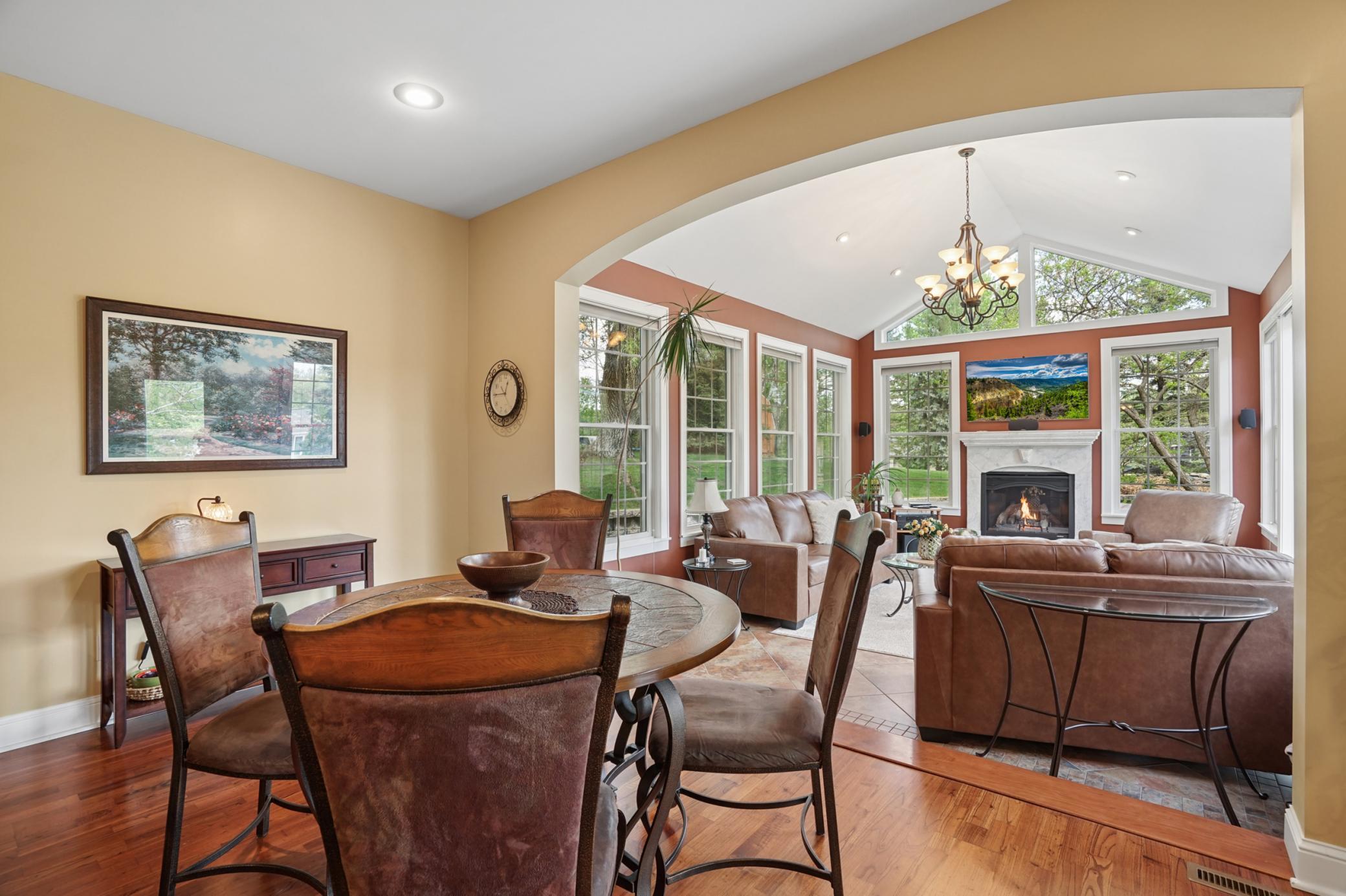 The nine foot ceilings throughout the main level lead to the vaulted ceiling in the sunroom with walls of windows surrounding you. This will quickly become one of your favorite spaces year-round with the gas fireplace and in-floor heat.