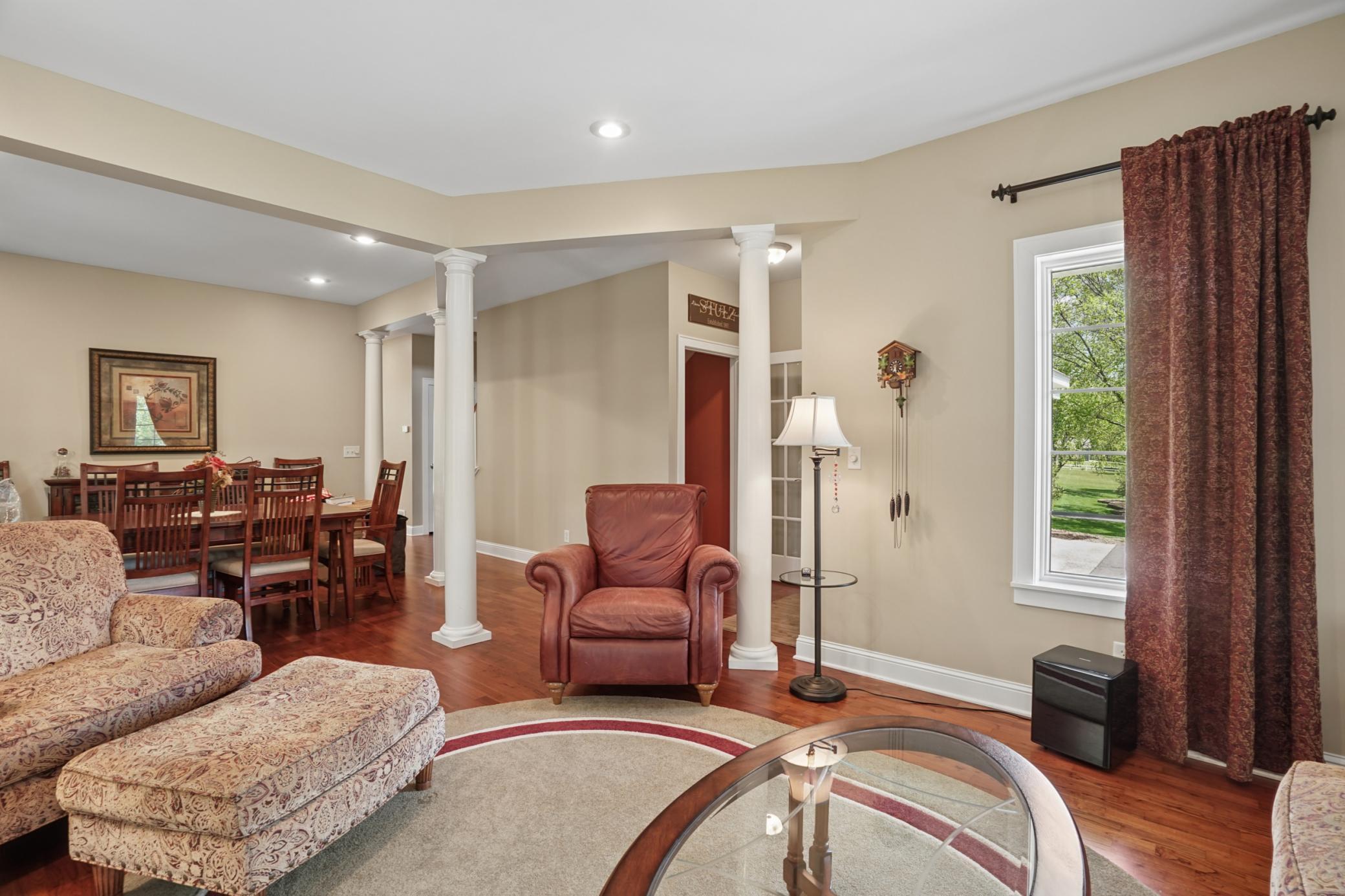 Just off the formal dining room is the den that overlooks the front yard and drive.
