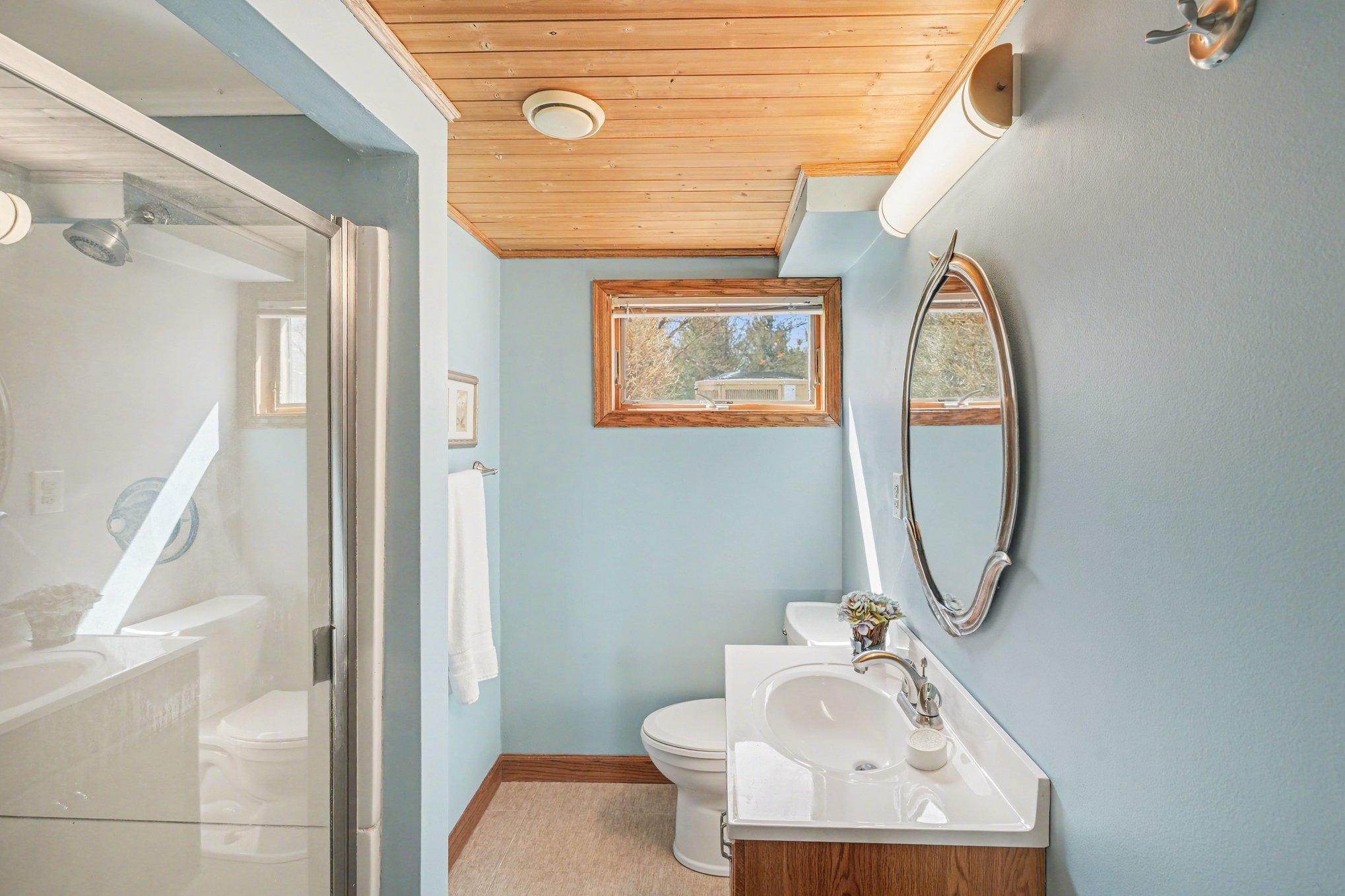 Lower Level Bathroom. Updated w/ 36" Cabinetry etc.