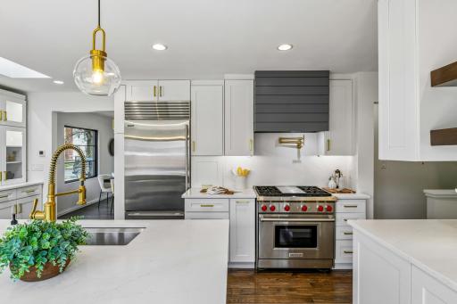 Impressive renovations are experienced throughout the home.