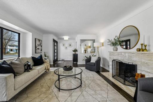 Beautiful hand-scaped wood flooring flows throughout the main floor gathering areas.